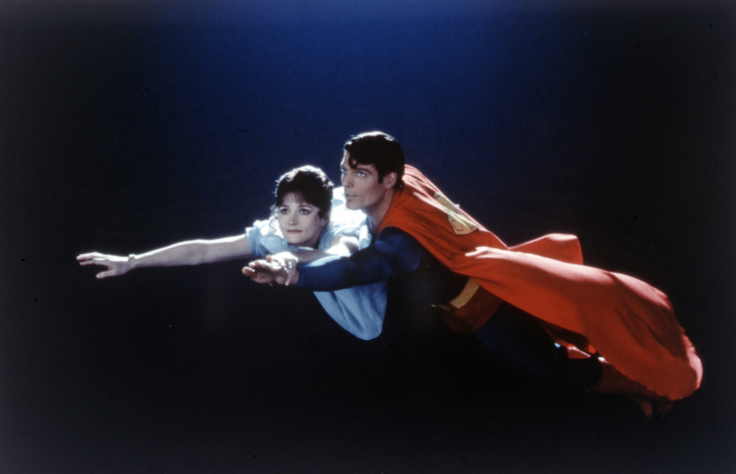 Lois Lane and Superman are flying over Metropolis in Superman (1978).