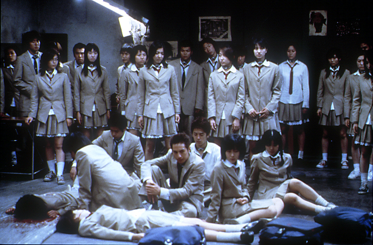 Battle Royale contestants standing in a classroom, about to embark on a battle to the death.