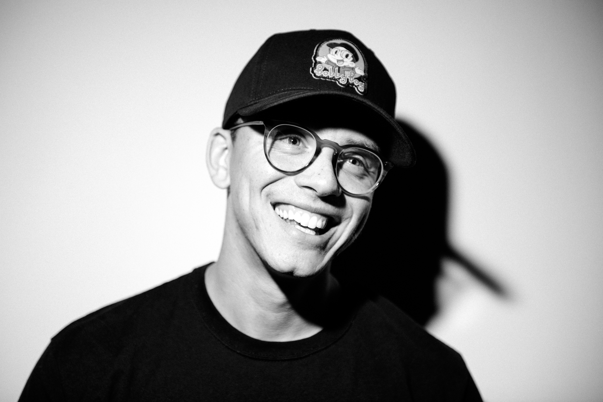 Logic smiling in black and white. 