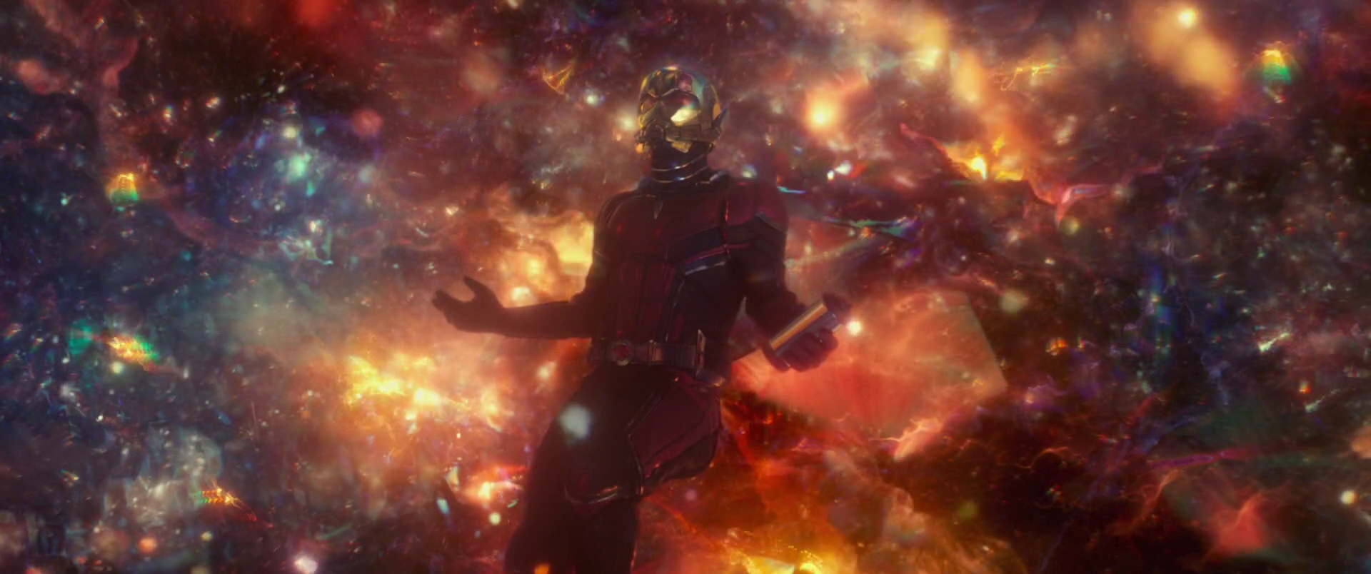 Ant-Man holds a canister of healing particles while trapped in the Quantum Realm.