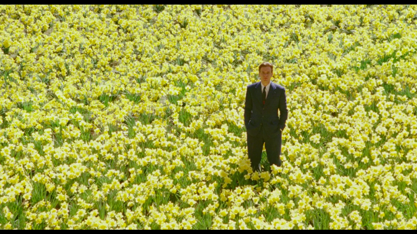 Edward Bloom stands in a field of Daffodils in the film Big Fish