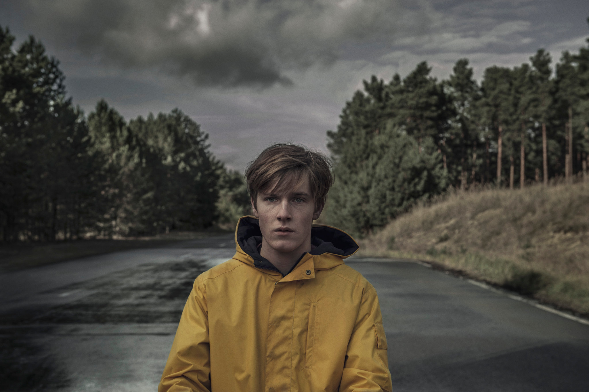 Jonas in the town of Winden, in his yellow rain-coat.