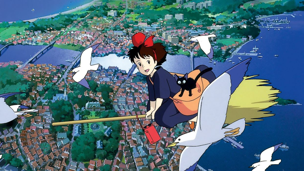 Kiki and Jiji fly above the landscape on her broom.