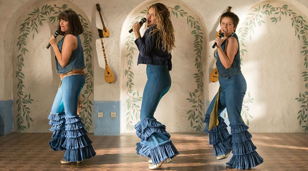 Donna performs at a cafe in Kalokairi with her girl group, Donna And The Dynamos