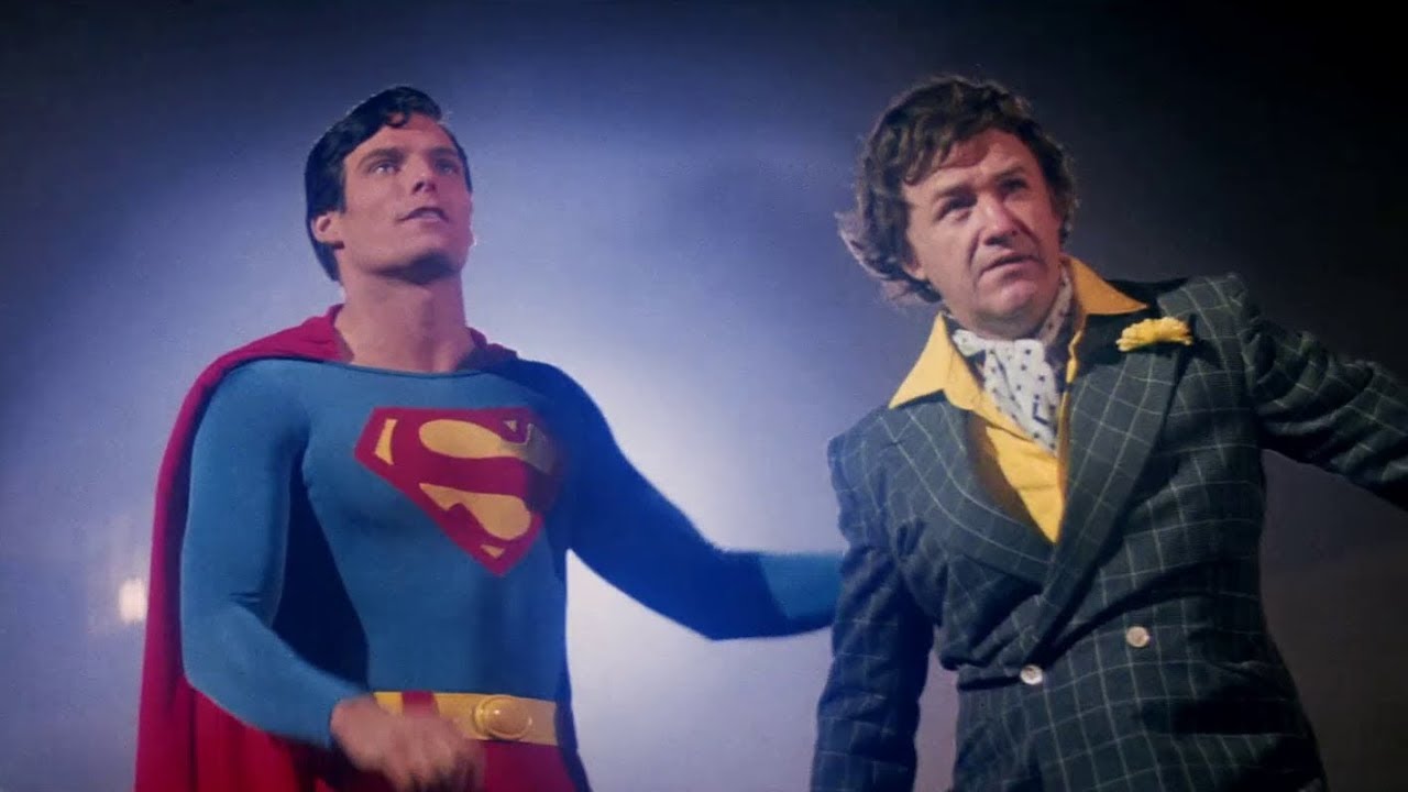 Lex Luthor is holding kryptonite while wearing a garish suit in Superman (1978).