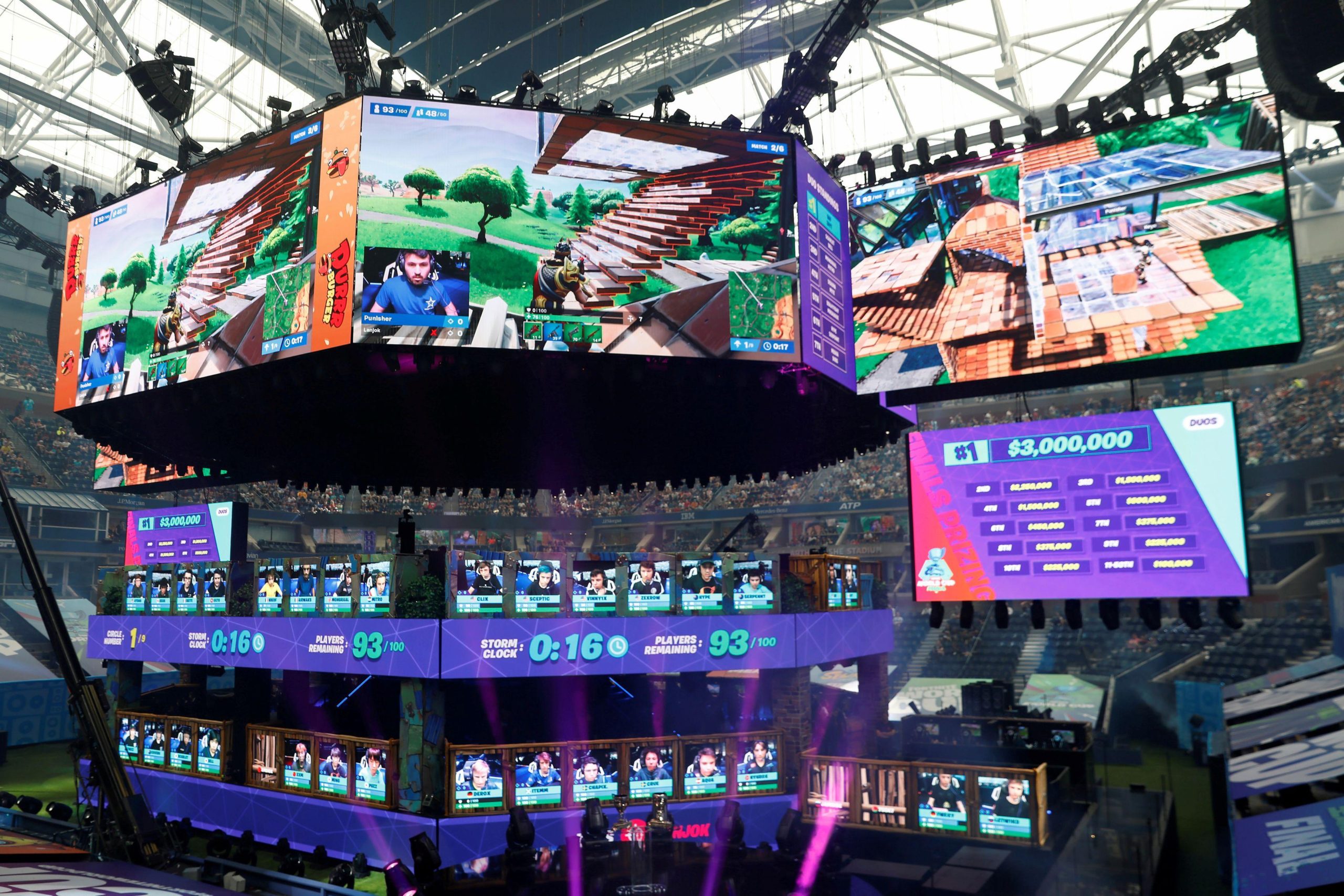 Players compete during the Fortnite World Cup Duos Finals at Flushing Meadows Arthur Ashe stadium.