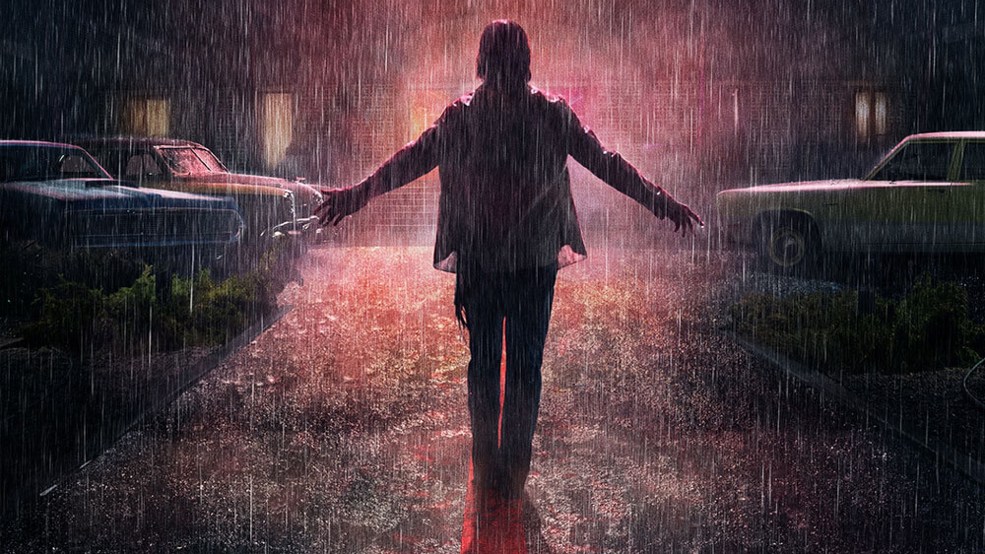 Billy Lee stands in the rain with his arms outstretched, illuminated by a neon sign. 