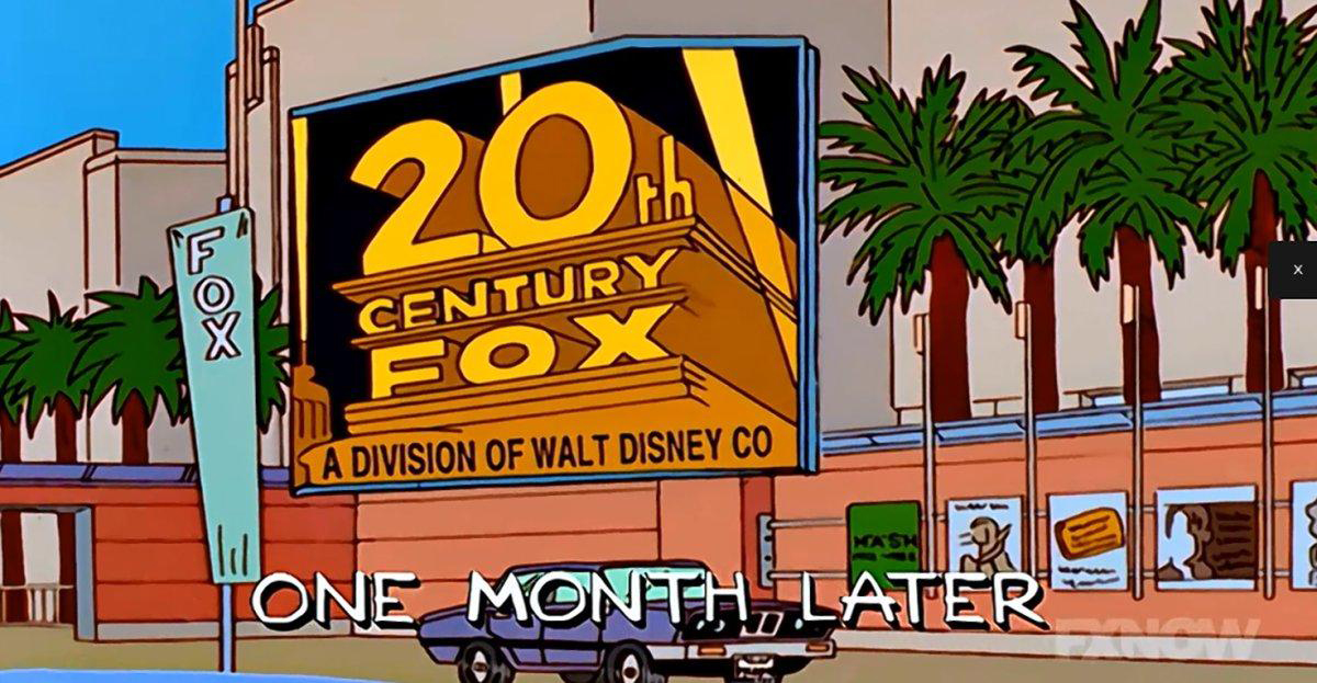 A 20th Century Fox sign fronts a Hollywood studio with the words "A Division of Walt Disney Co" underneath in small letters.