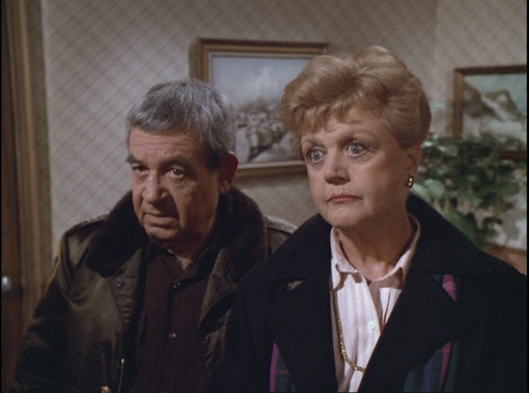 Amos Tupper and Jessica Fletcher stare off-camera in Murder, She Wrote.