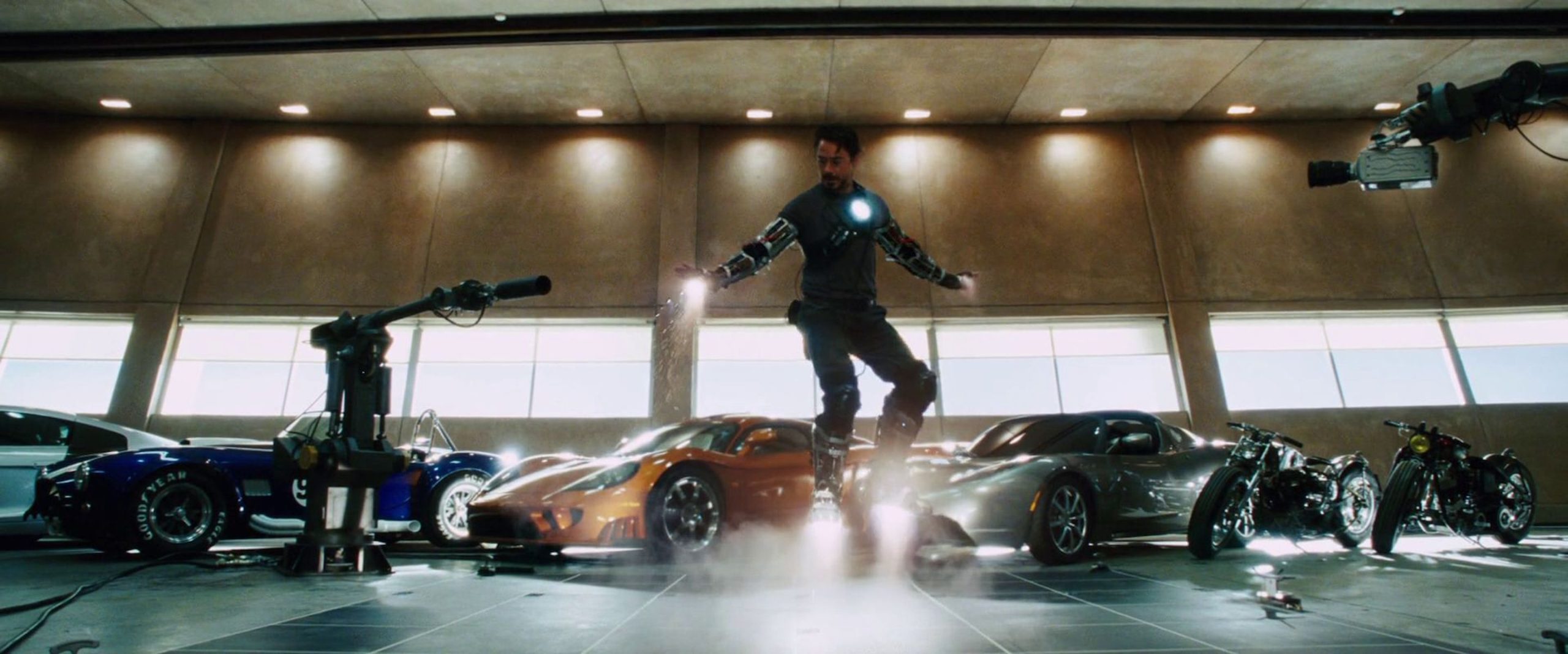 This is a shot from Iron Man (2008) when Tony Stark was testing out the iron man suit's flying ability in his garage.