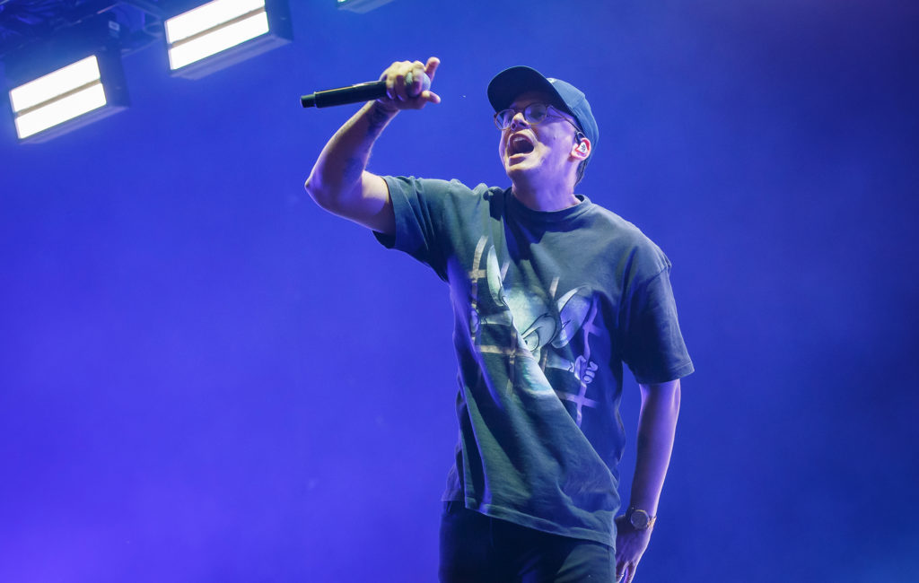 Logic performing at a concert. 
