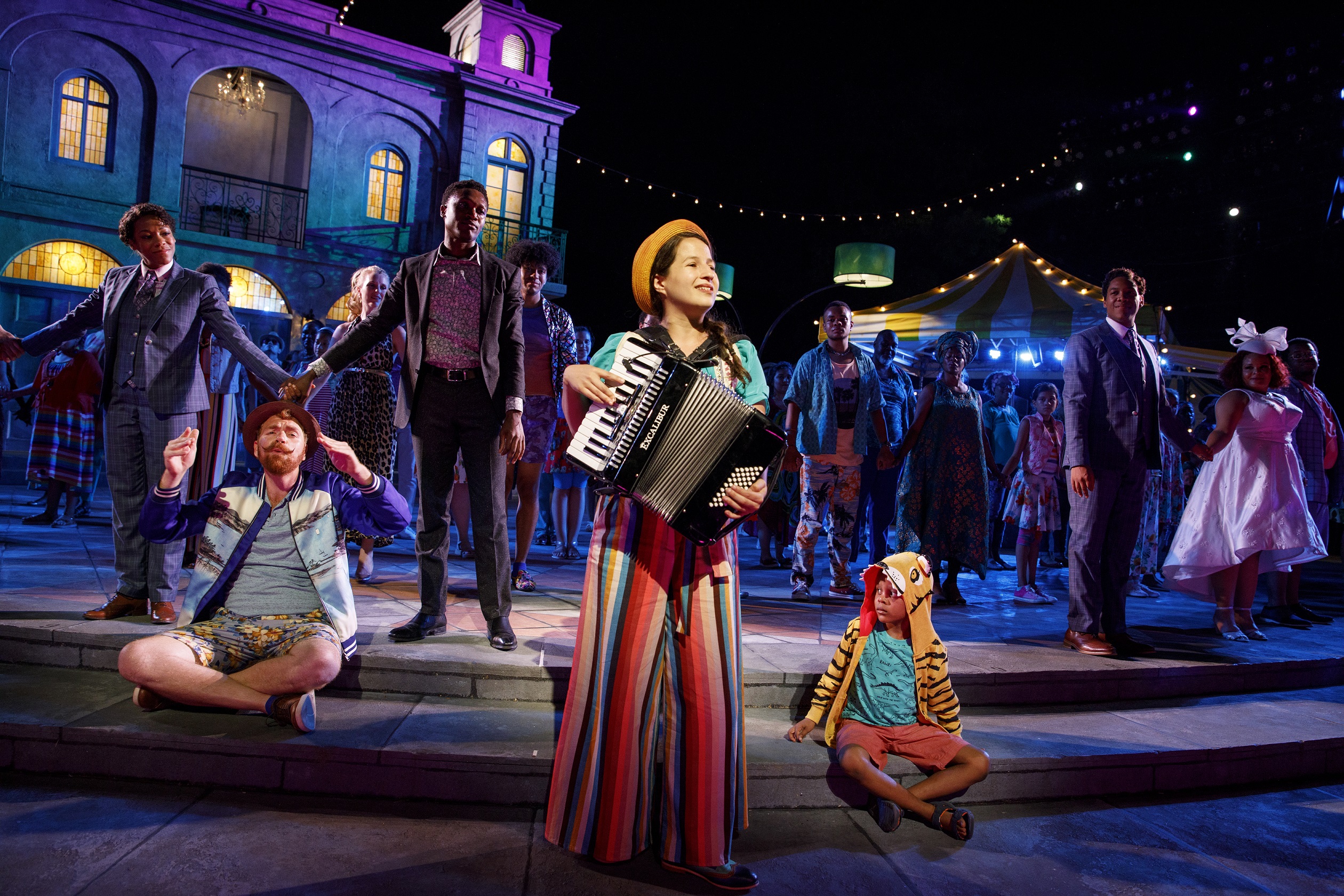 Shaina Taub as The Fools plays the accordion in the stage production of the musical cast album Twelfth Night.