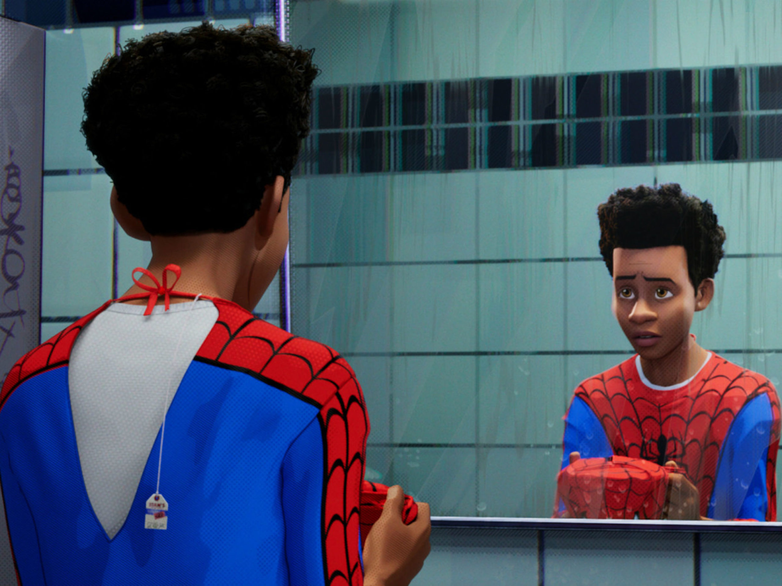 This image is from Spider-Man: Into the Spider-Verse (2018), where Miles is seen staring at himself in the mirror, while he puts on the Spider-Man costume.