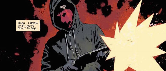 A single Kill or Be Killed comic book panel showing the hooded, red-mask wearing Dylan firing a shotgun.