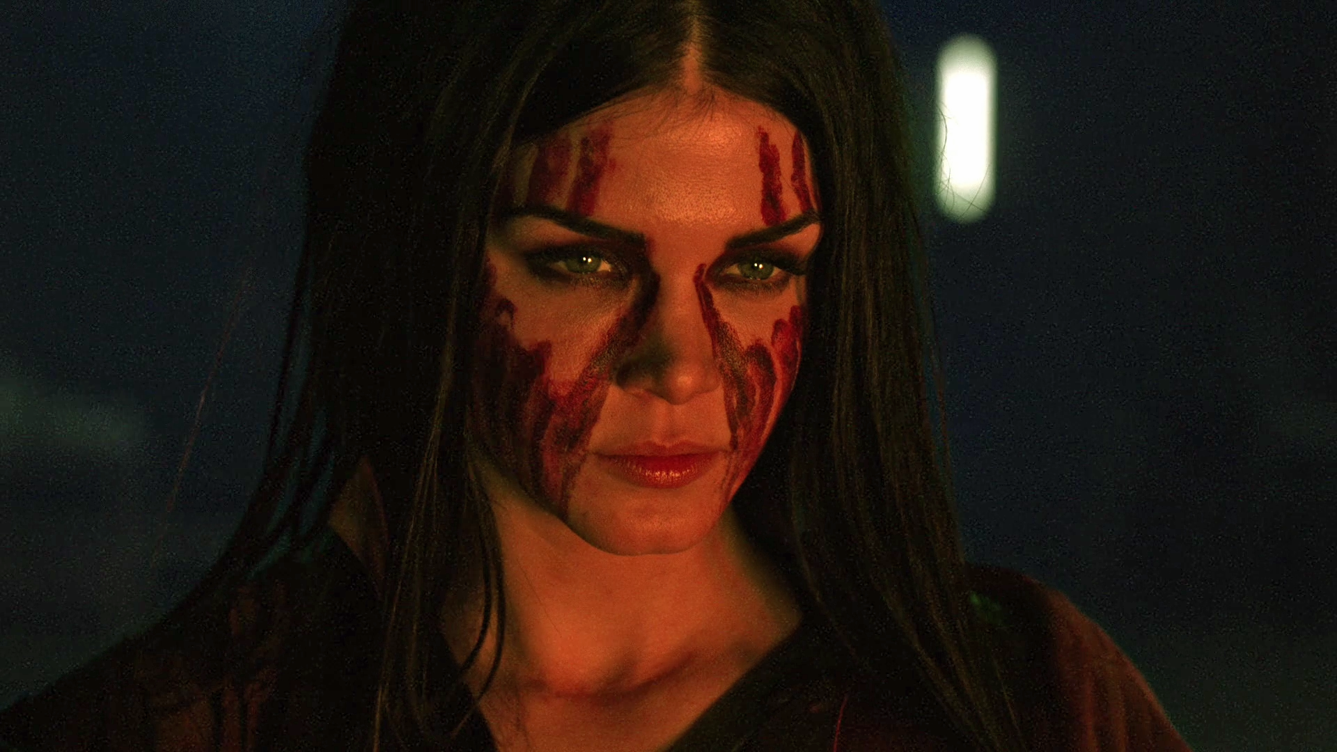 Octavia embraces the Blodreina title by marking her face with the blood of the enemies of Wonkru.