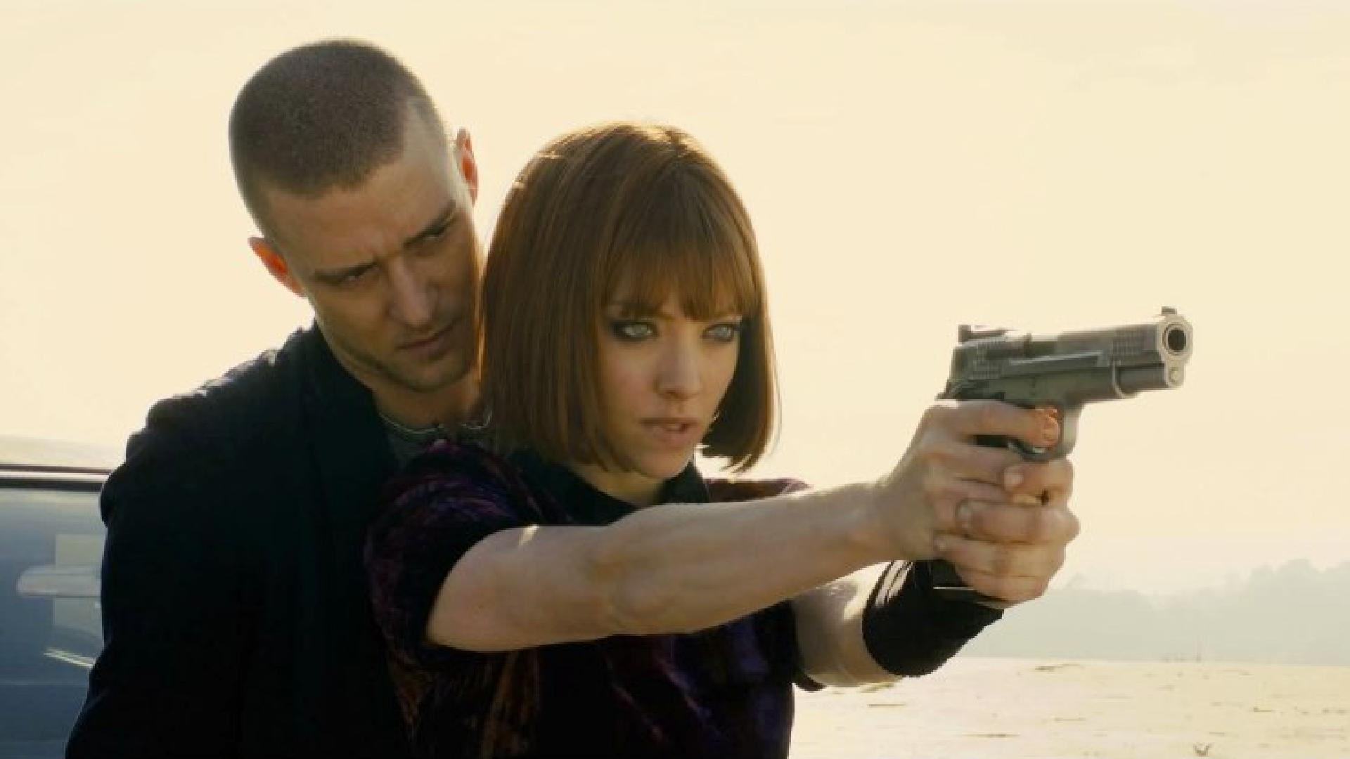 Will teaches Sylvia how to shoot a gun.