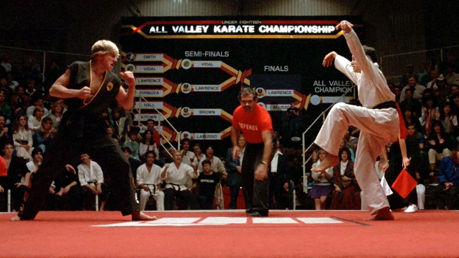 A young Daniel prepares to strike Johnny with the crane kick in the original Karate Kid film.