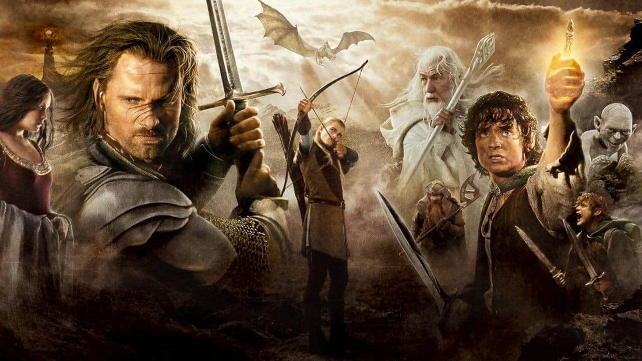 A promotional poster showing Aragorn, Frodo, and others against a fiery, cloudy sky.