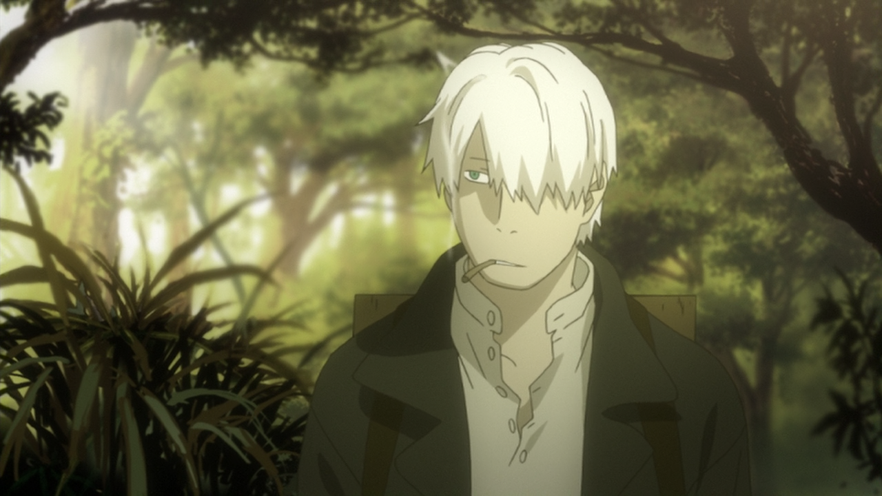 Ginko, the main character of Mushishi, stands in a forest smoking a cigarette. 