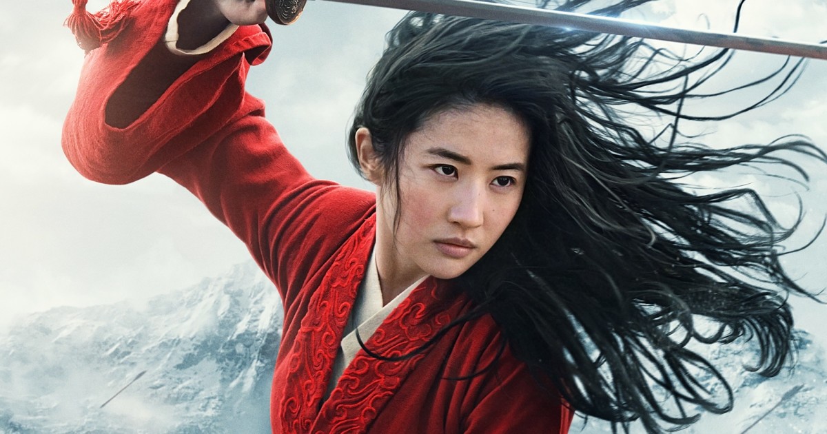 The latest star of the Disney family of remakes, Mulan wields a sword above her head against a snowy mountain backdrop.