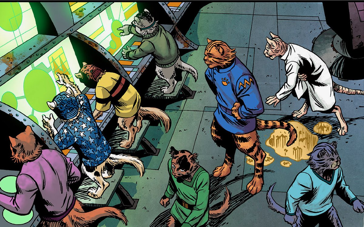 Captain Ginger watches over his cat crew in Captain Ginger: Dogworld #1. 