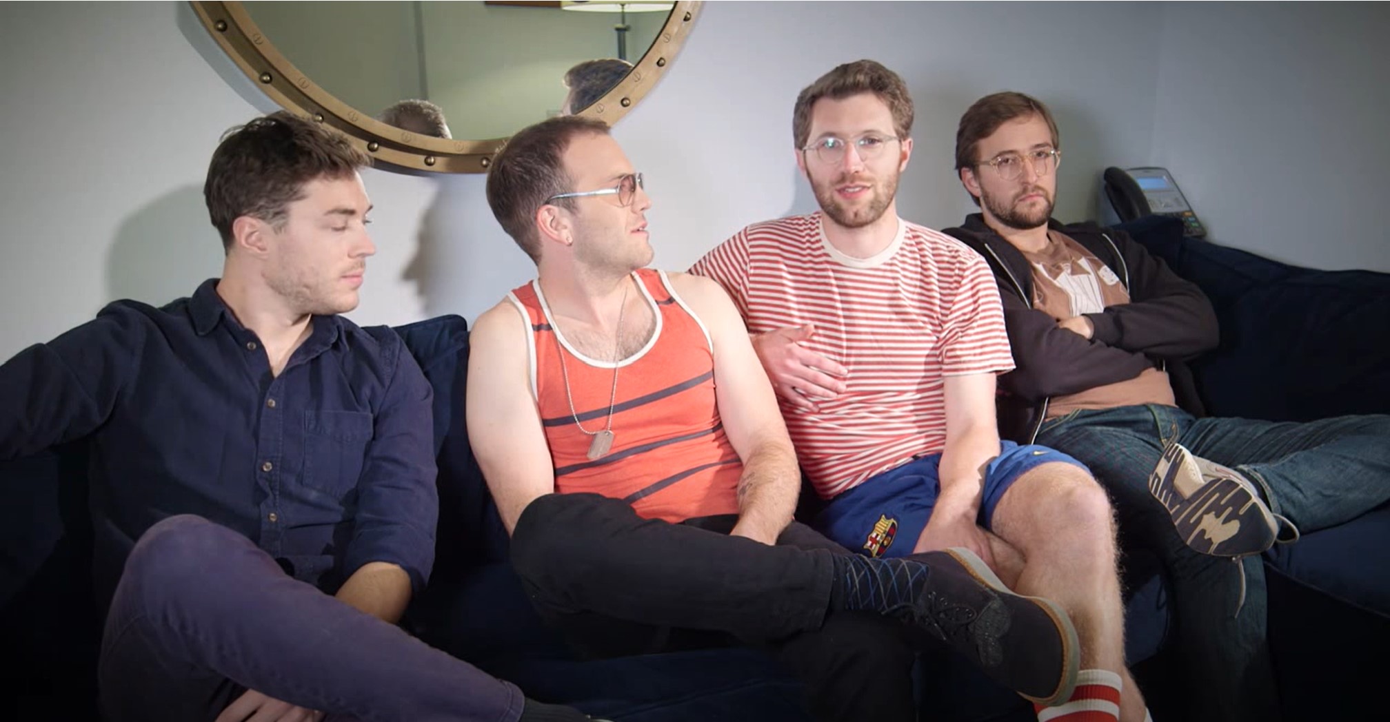 Founding Vulfpeck members Joe Dart, Theo Katzman, Jack Stratton, and Woody Goss lined up on a couch for their Late Show interview. 