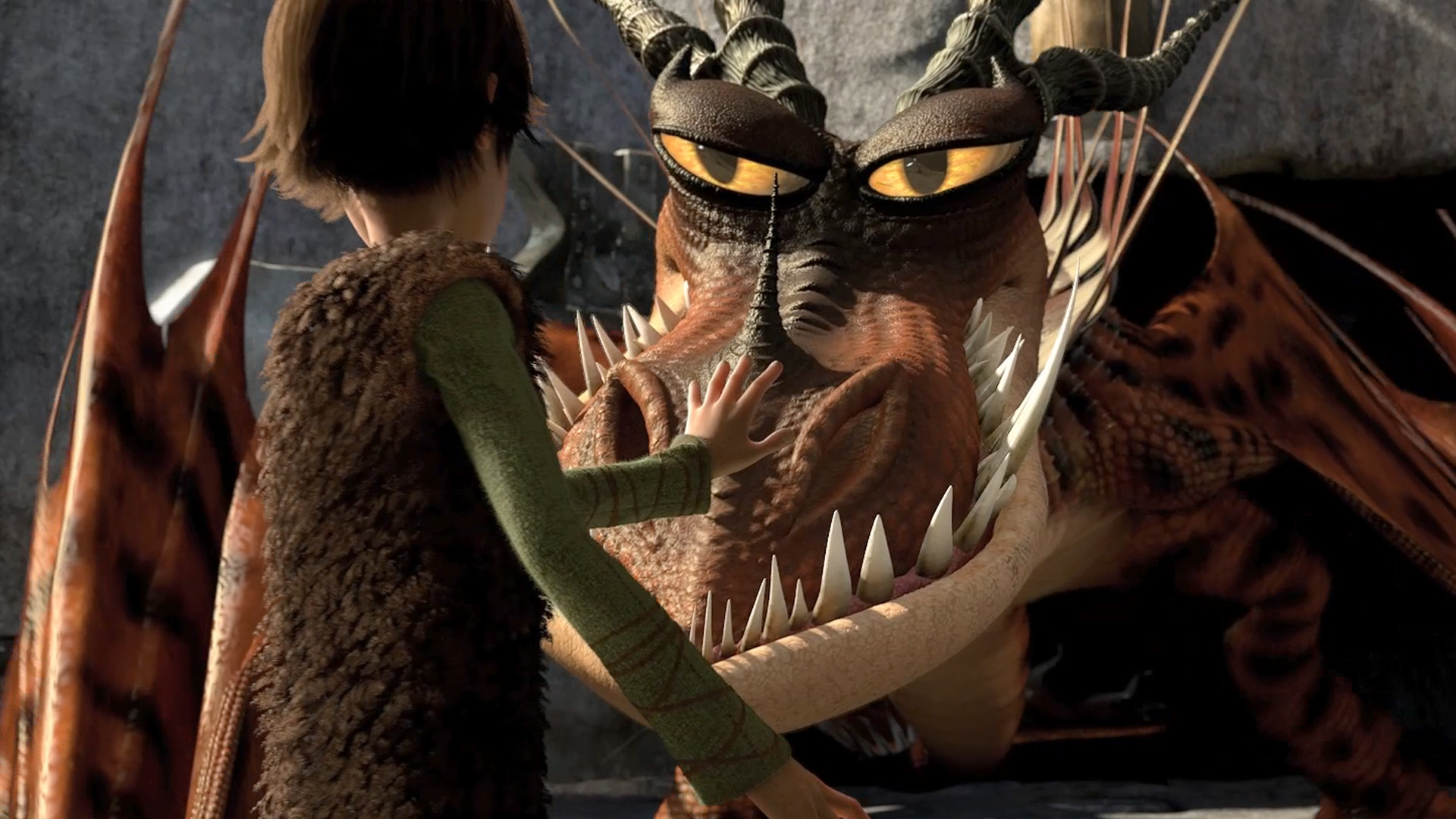 Hiccup attempts to tame a large, wary dragon in the training ring.