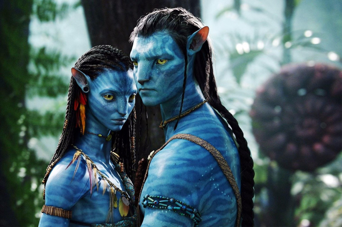 Jake and Neytiri stand close to each other.