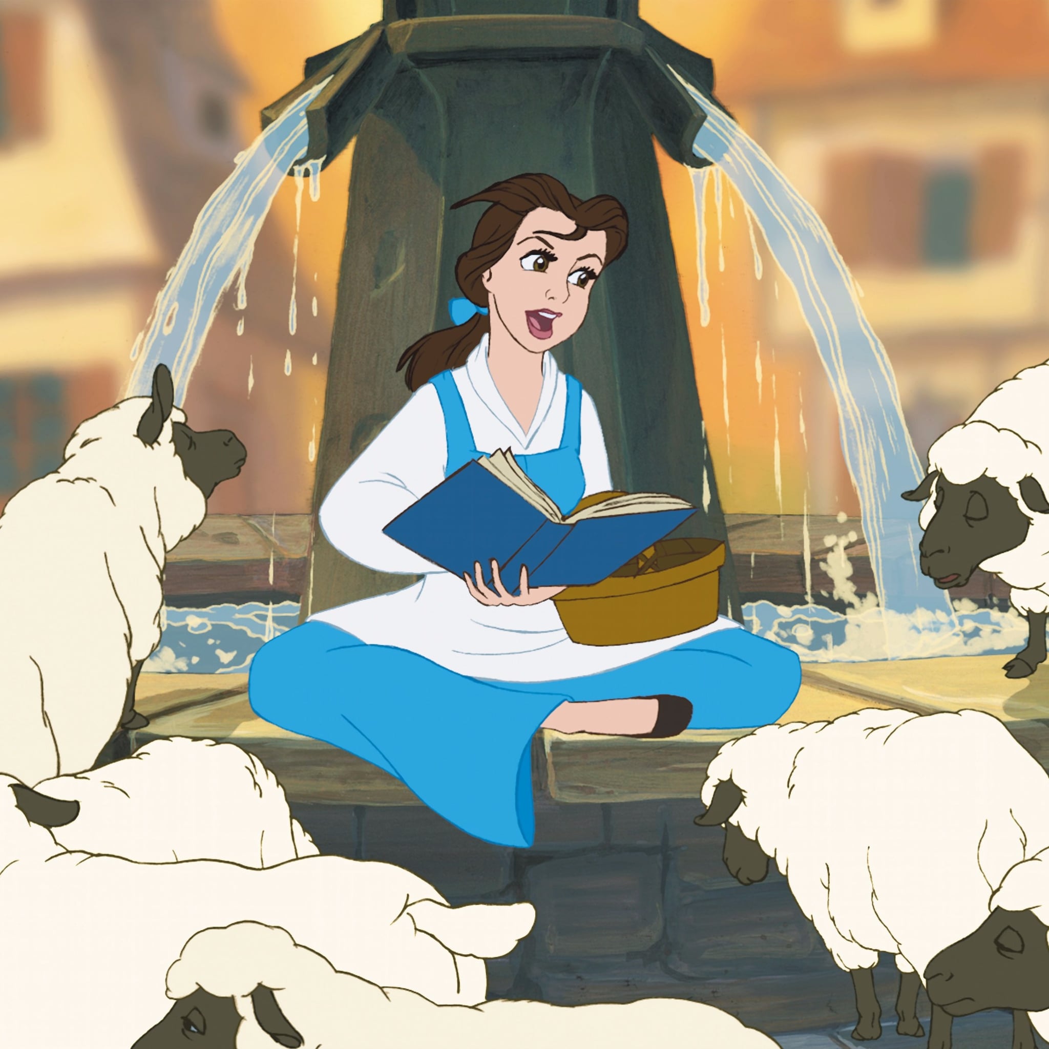 Belle reads from a book to sheep in front of a fountain.