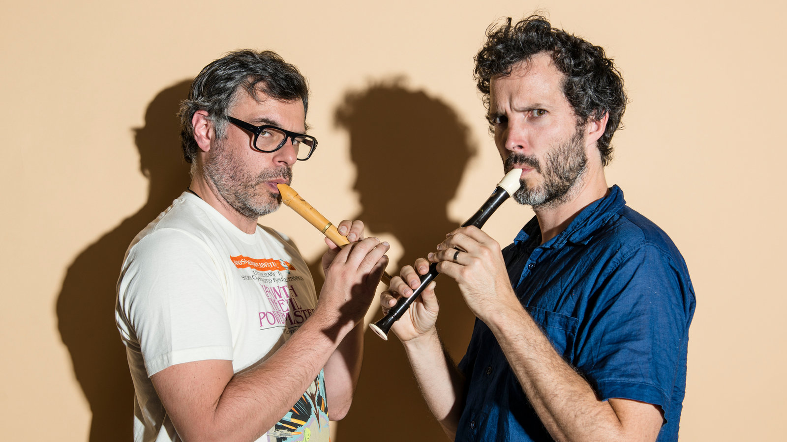 Bret McKenzie and Jemaine Clement pose with instruments for their comedy sketch show.
