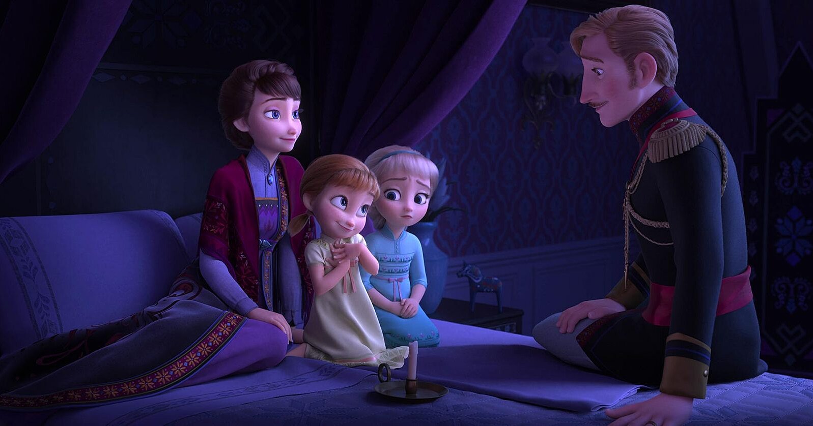 Young Elsa, Young Anna, and their mother listen to King Agnarr's story in the beginning of Frozen II.