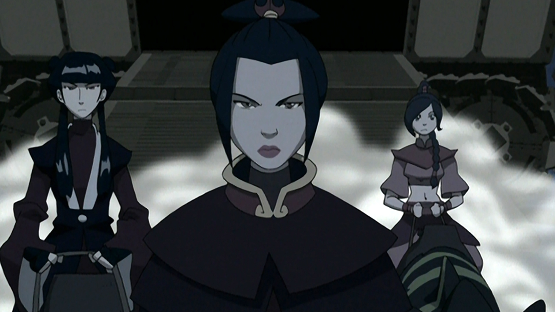 Surrounded by dust, Azula, Mai, and Ty Lee ride out of a tank on large, lizard-like creatures.