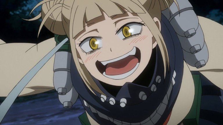 The most popular villain in My Hero Academia Toga Himiko smiling as she goes in for an attack.