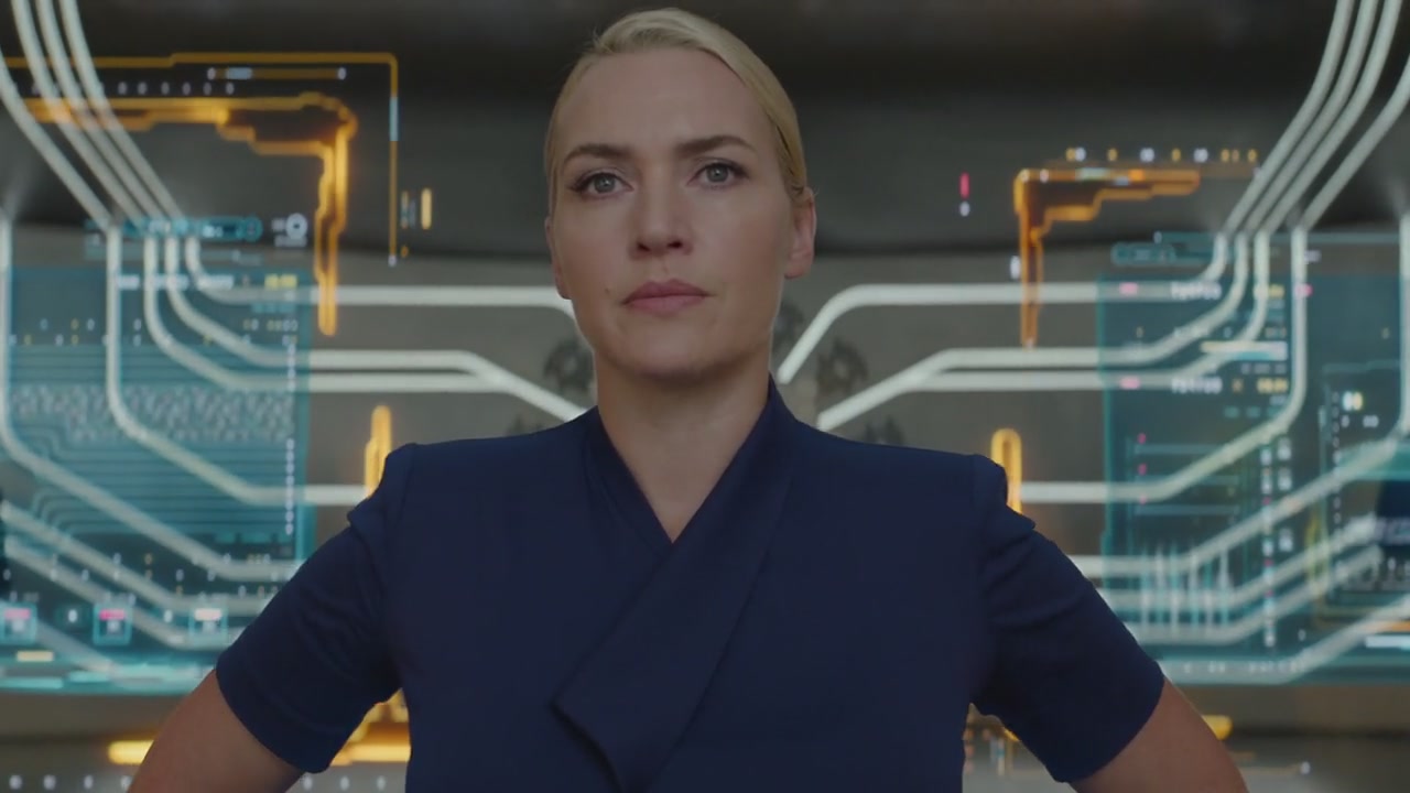 Kate Winslet plays the evil Jeanine in Divergent, surrounded by glowing wires and technology.