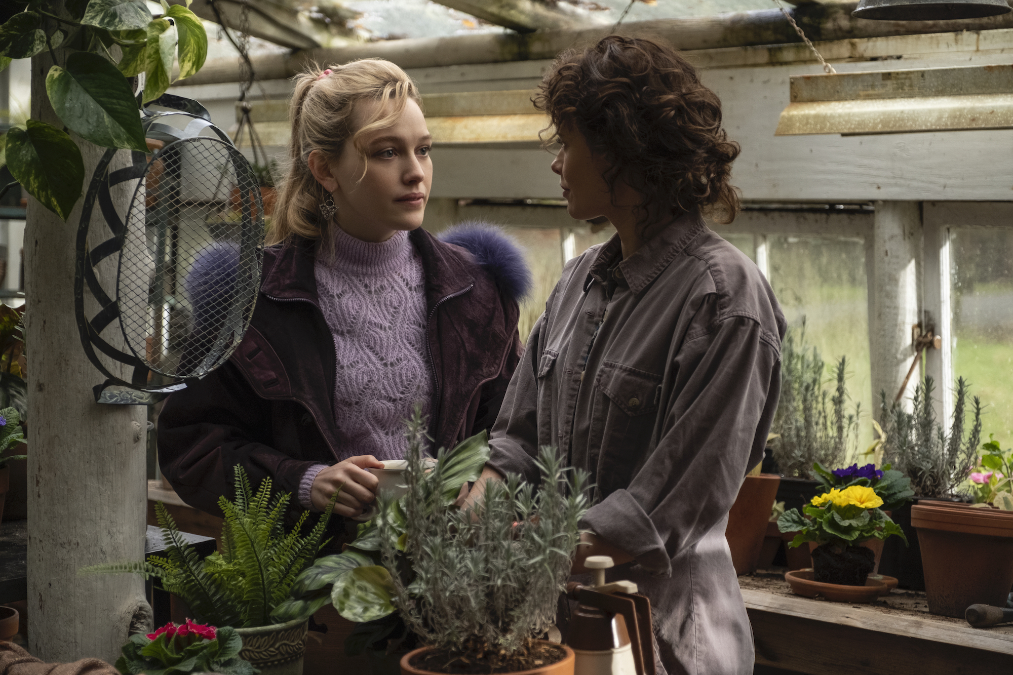 Dani and Jamie share a conversation in Jamie's greenhouse on Bly Manor grounds.