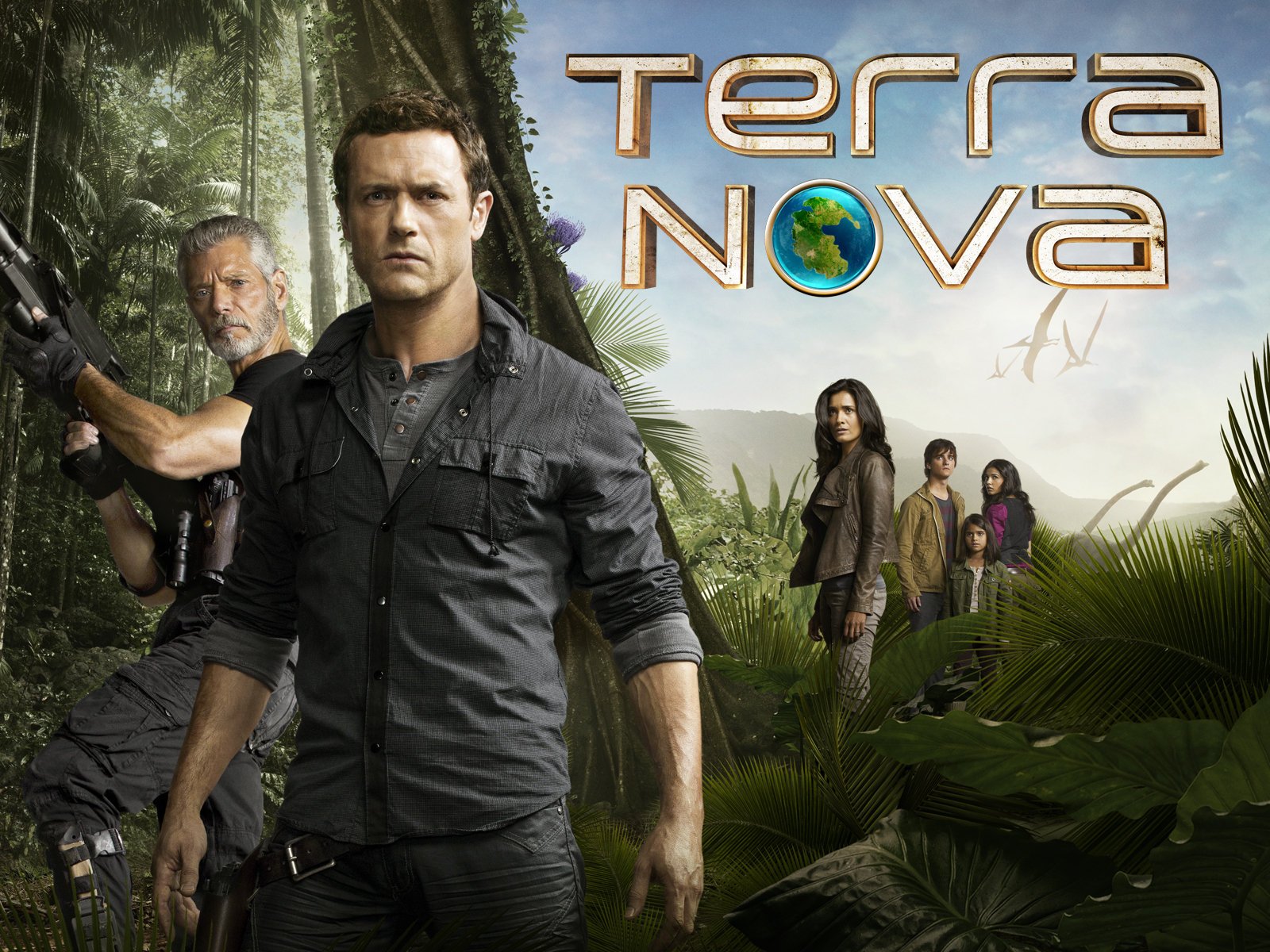 The main cast members of Terra Nova with dinosaurs in the background of their new reality.
