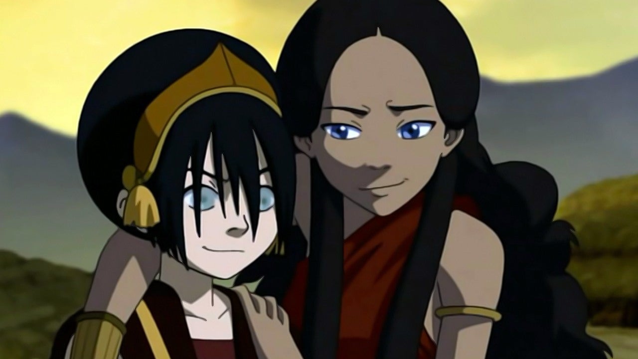 Katara puts her arm around Toph after they forgive each other for an earlier fight.