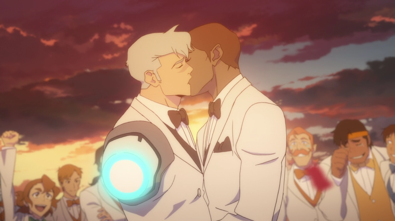 Newly-weds Shiro and Curtis share a kiss. 