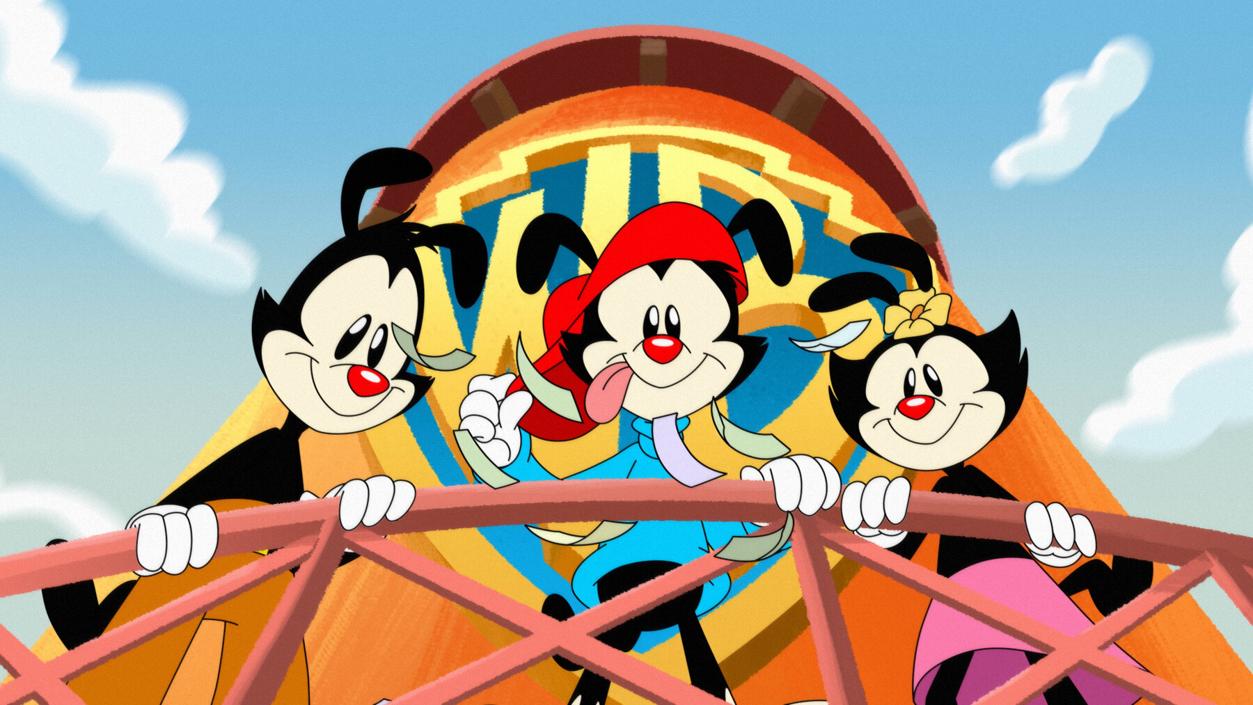 Yakko, Wakko, and Dot looking down from the Warner tower. (Animaniacs 2020)