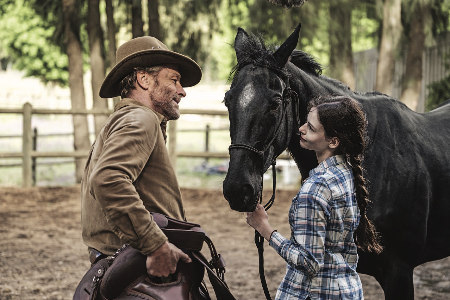 Jo learns horsemanship from her uncle John.