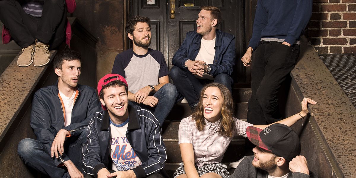 Lawrence, a soul-pop band, sits on steps in New York for a promotional image.