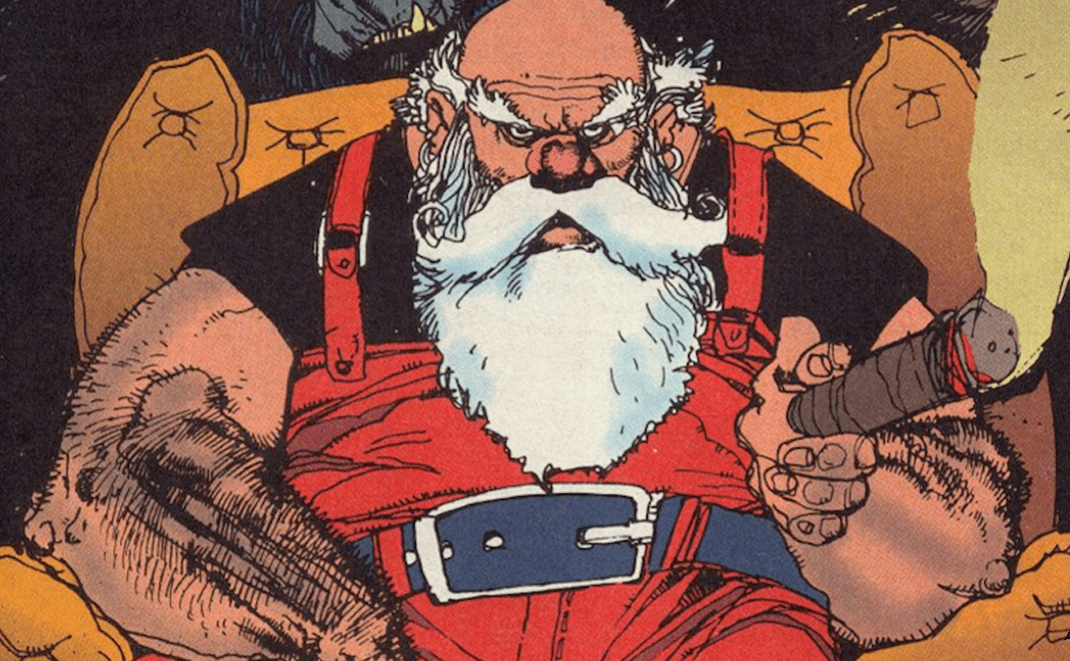 A gruff Santa Claus with huge arms sits in a chair with a cigar. He is wearing red overalls but no hat. 