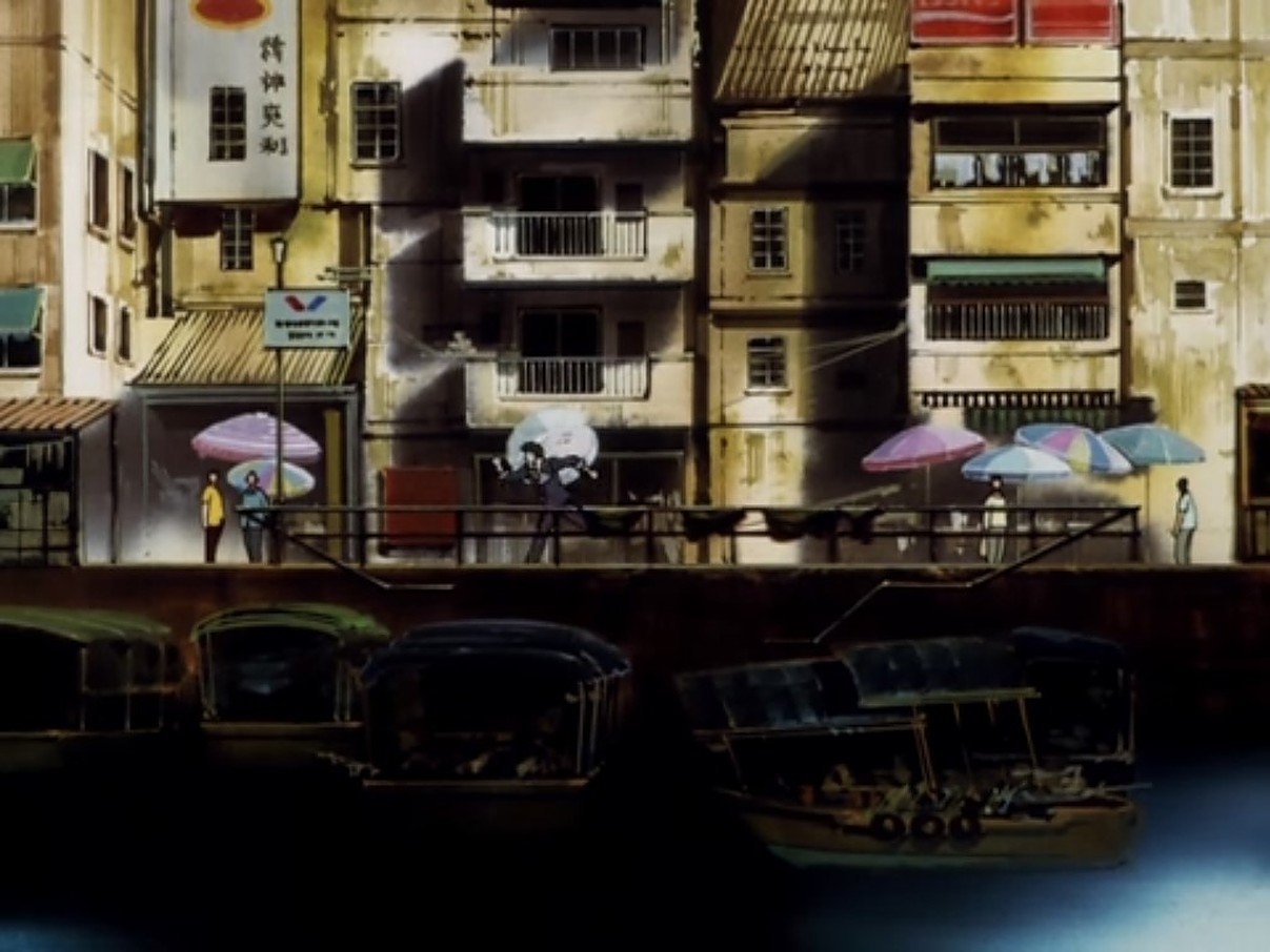 Spike Spiegel from Cowboy Bebop runs through a city.