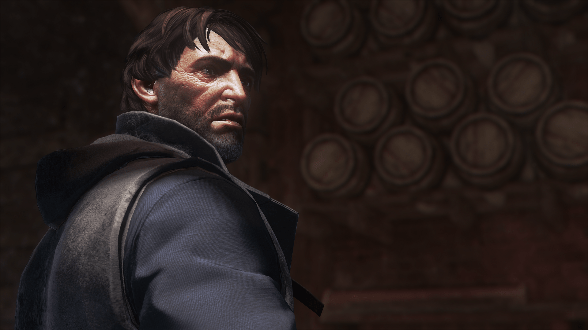 Corvo's body is facing away, and he is looking over his right shoulder into the distance.