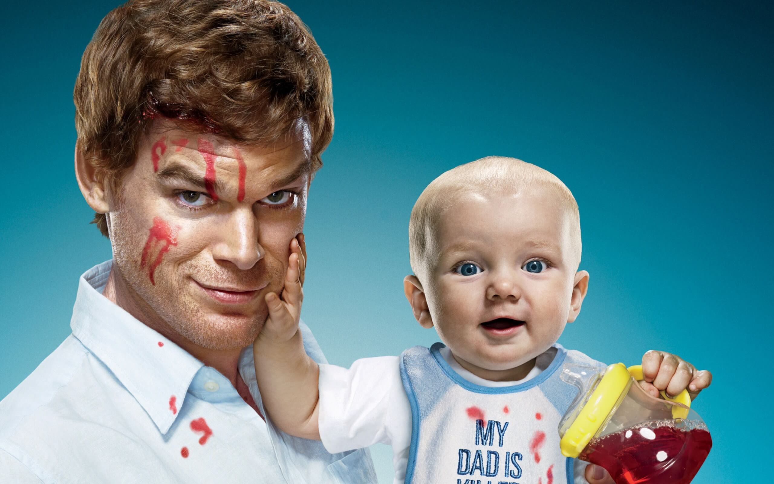 Dexter holding his son Harrison with red  juice (symbolizing blood) splashed all over his smiling face.