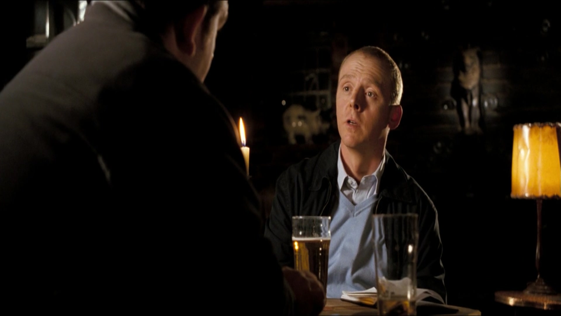 Simon Pegg (center) as Sergeant Nicholas Angel in a pub in the movie Hot Fuzz.