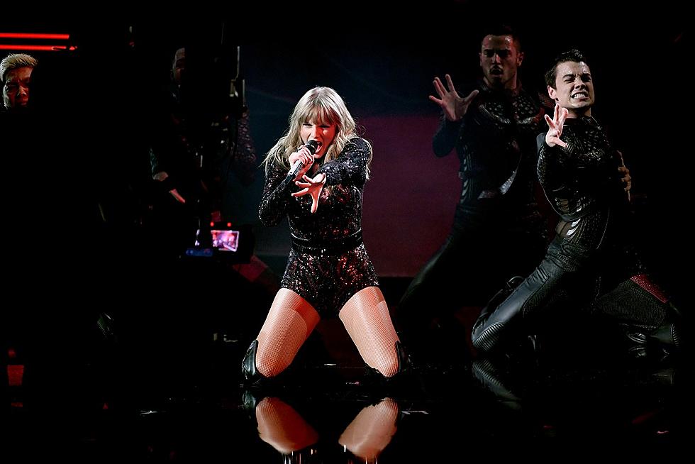 Swift performs "I Did Something Bad" at the AMAs in a glittering black bodysuit.