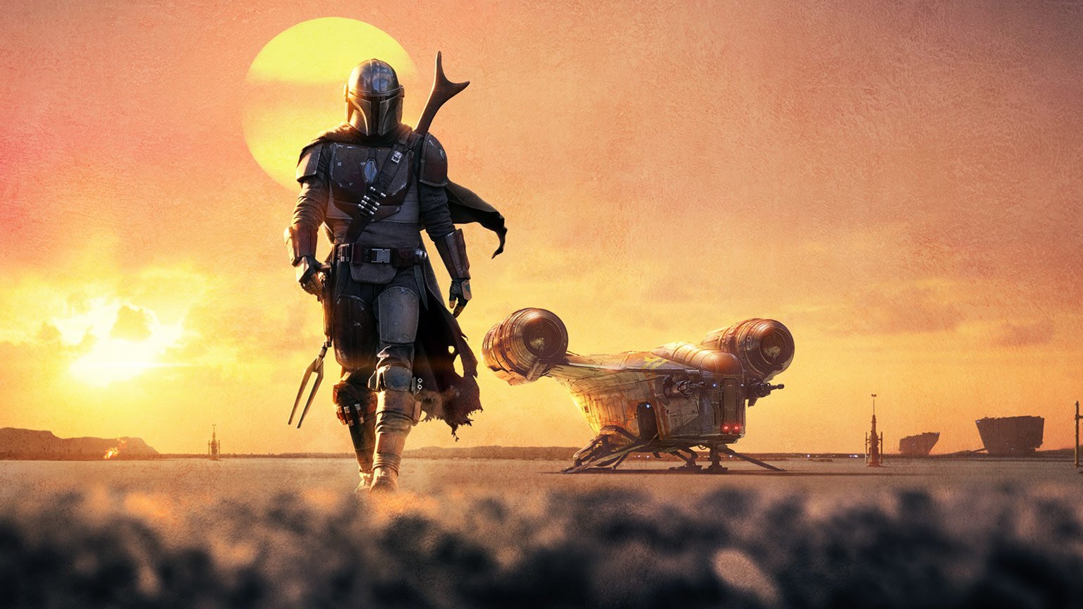 The Mandalorian walks away from his ship before a hazy orange sunset.