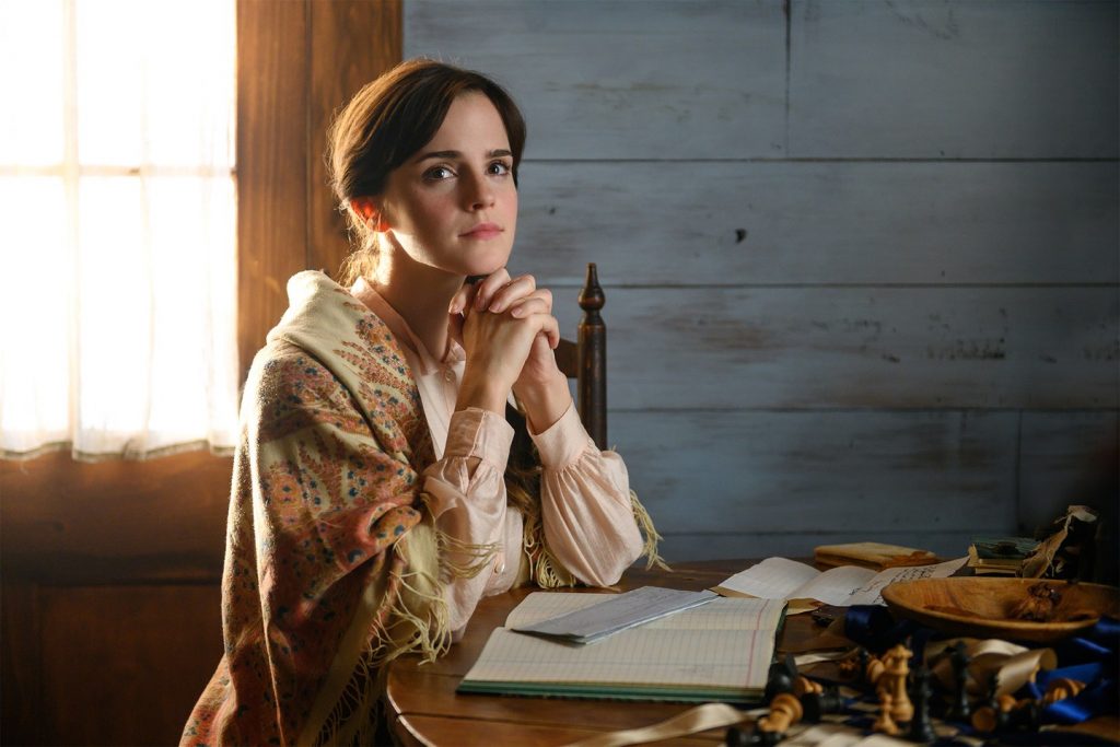 Emma Watson playing as Margaret march, looking off into the distance. Photo from Greta Gerwig's version of The Little Women (2019). 