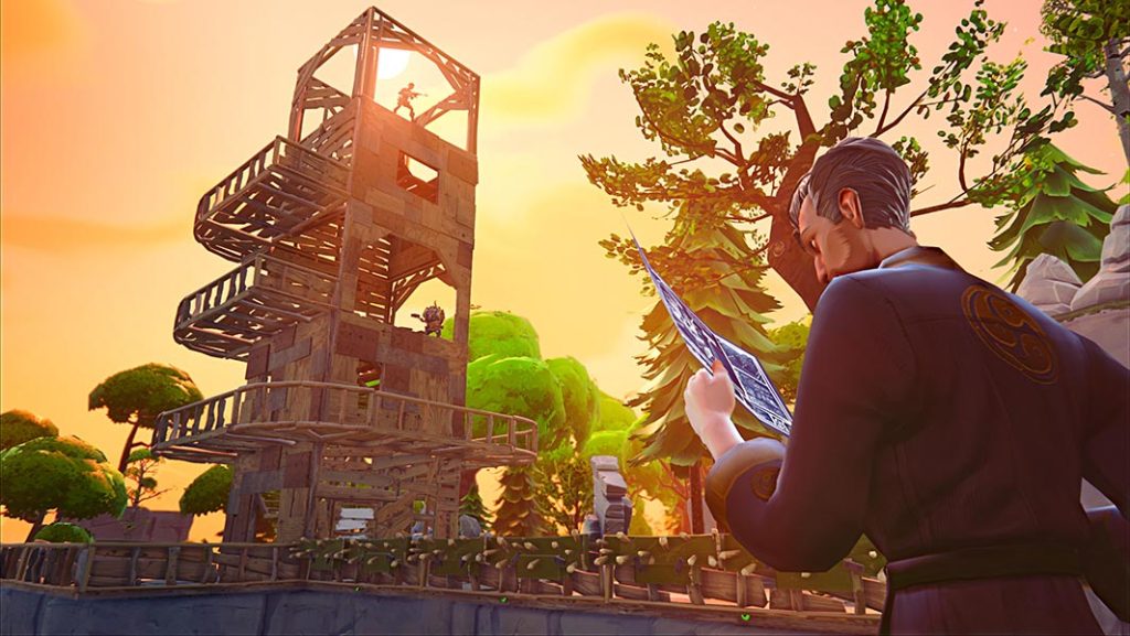 A male Fortnite character in "build" mode peering at blueprints in his hand, while two other characters are perched on a wooden tower ahead. (Source: Guinness World Records)